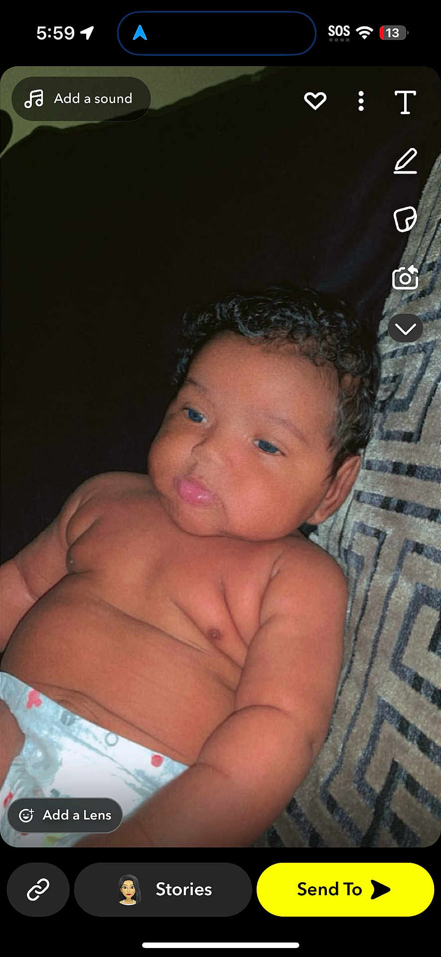 Tykir is registered to the contest to win money with this photo: baby, infant, diaper, curly_hair, cushion, indoor, child, skin, face, expression, portrait, person, relaxing, comfort, cute, young, newborn, plump, sleepy, resting