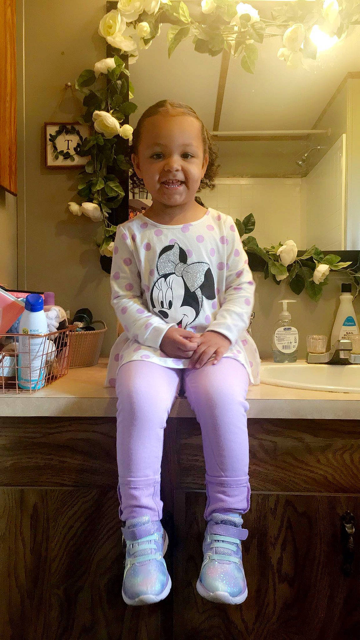 Greyson is registered to the contest to win money with this photo: baby, baby_toddler_clothing, boot, bottle, child, child_model, drinkware, houseplant, human, joy, knee_high_boot, person, picture_frame, pink, plastic_bottle, sock, toddler, water_bottle, white