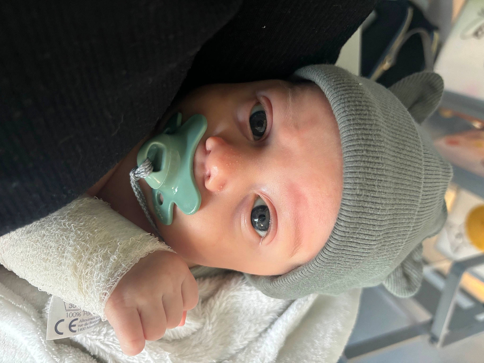 Ilÿano participe au concours pour gagner de l'argent avec cette photo : baby, baby_toddler_clothing, cap, cheek, child, chin, close_up, comfort, eye, eyebrow, eyelash, fashion_accessory, headgear, headwear, iris, lip, mouth, nose, person, skin