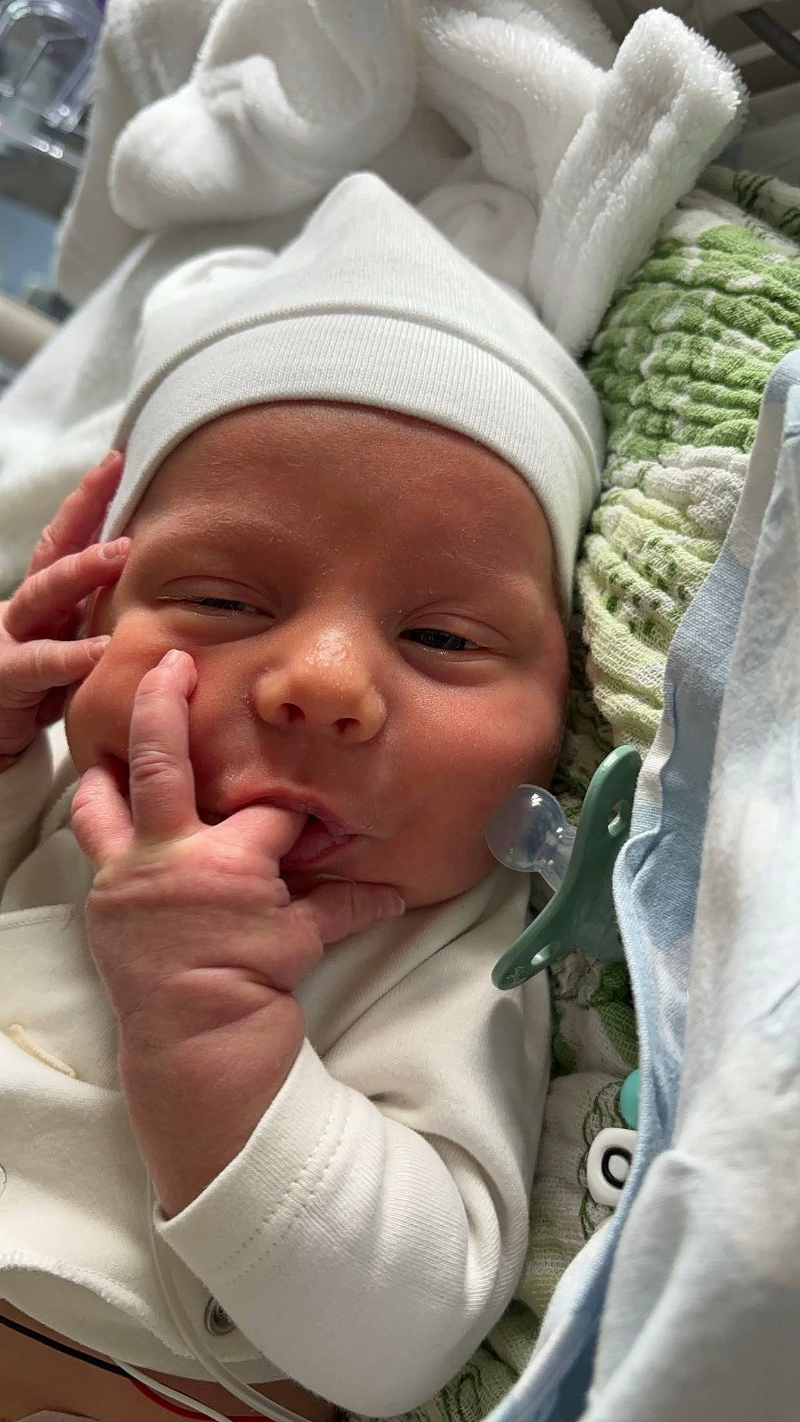 Ilÿano participe au concours pour gagner de l'argent avec cette photo : baby, cap, cheek, chin, eyebrow, eyelash, finger, forehead, fun, gesture, happy, lip, mouth, nose, person, product, skin, smile, thumb, toddler