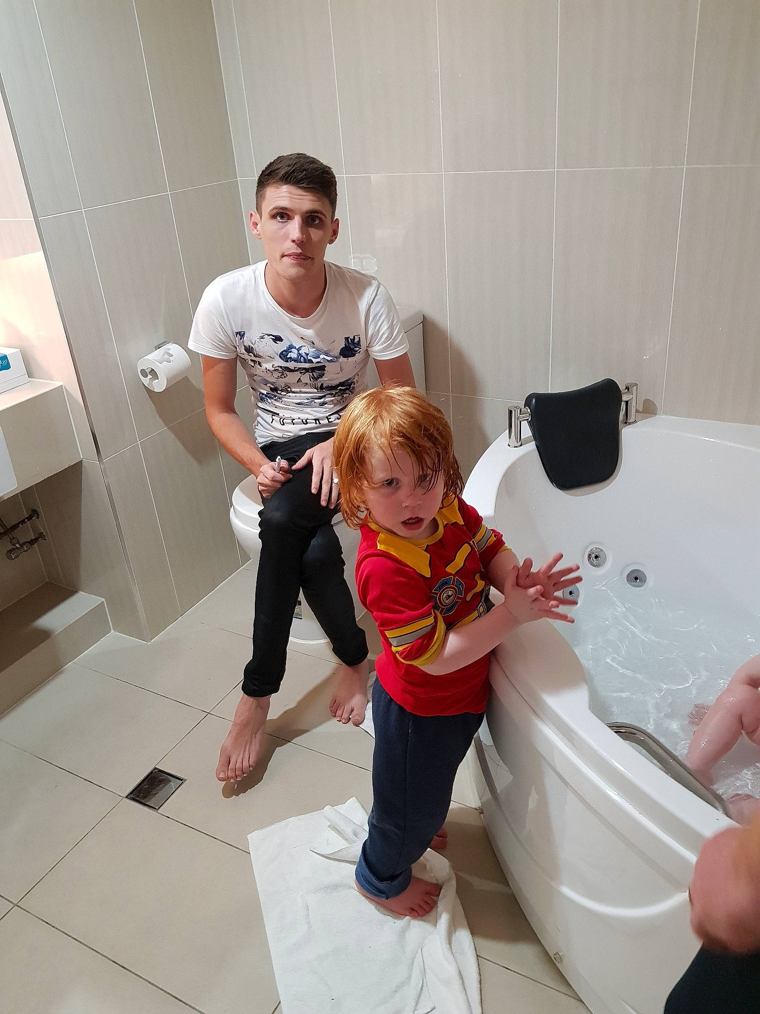 Riley joined the competition — help win amazing prizes! bathing, bathroom, child, fictional_character, floor, fun, leg, person, plumbing_fixture, room, t_shirt, toddler, vacation