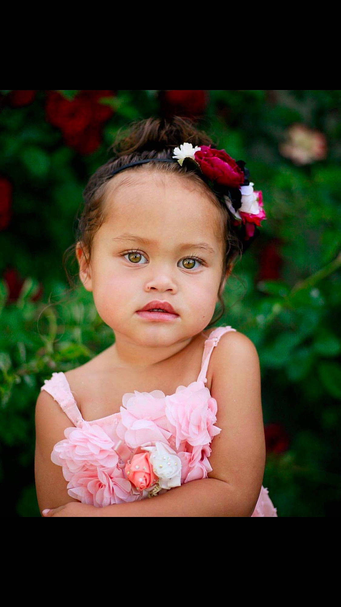 Shia joined the competition — help win amazing prizes! baby, cheek, child, child_model, dress, fashion_accessory, flower, hair_accessory, headband, headgear, headpiece, person, petal, photography, pink, plant, portrait, red, skin, smile