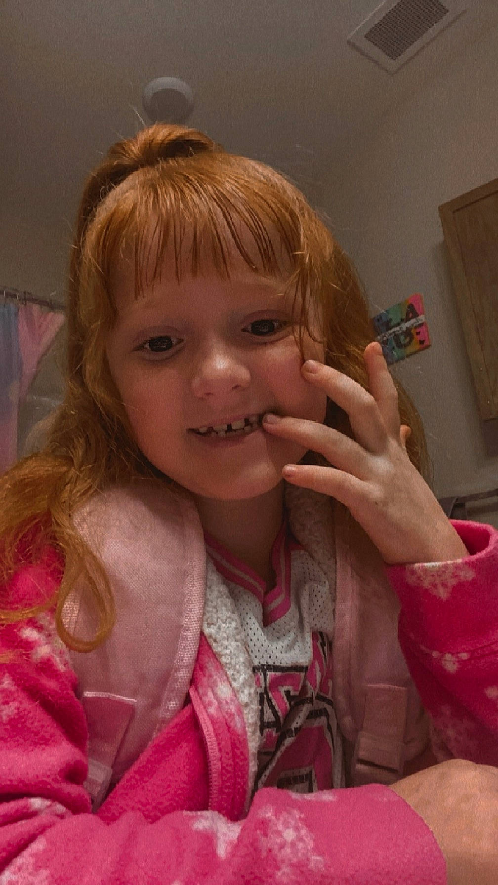 Avianna is registered to the contest to win money with this photo: cheek, chin, ear, eye, eyebrow, eyelash, finger, gesture, happy, iris, joy, lip, mouth, neck, nose, person, pink, skin, smile, thumb