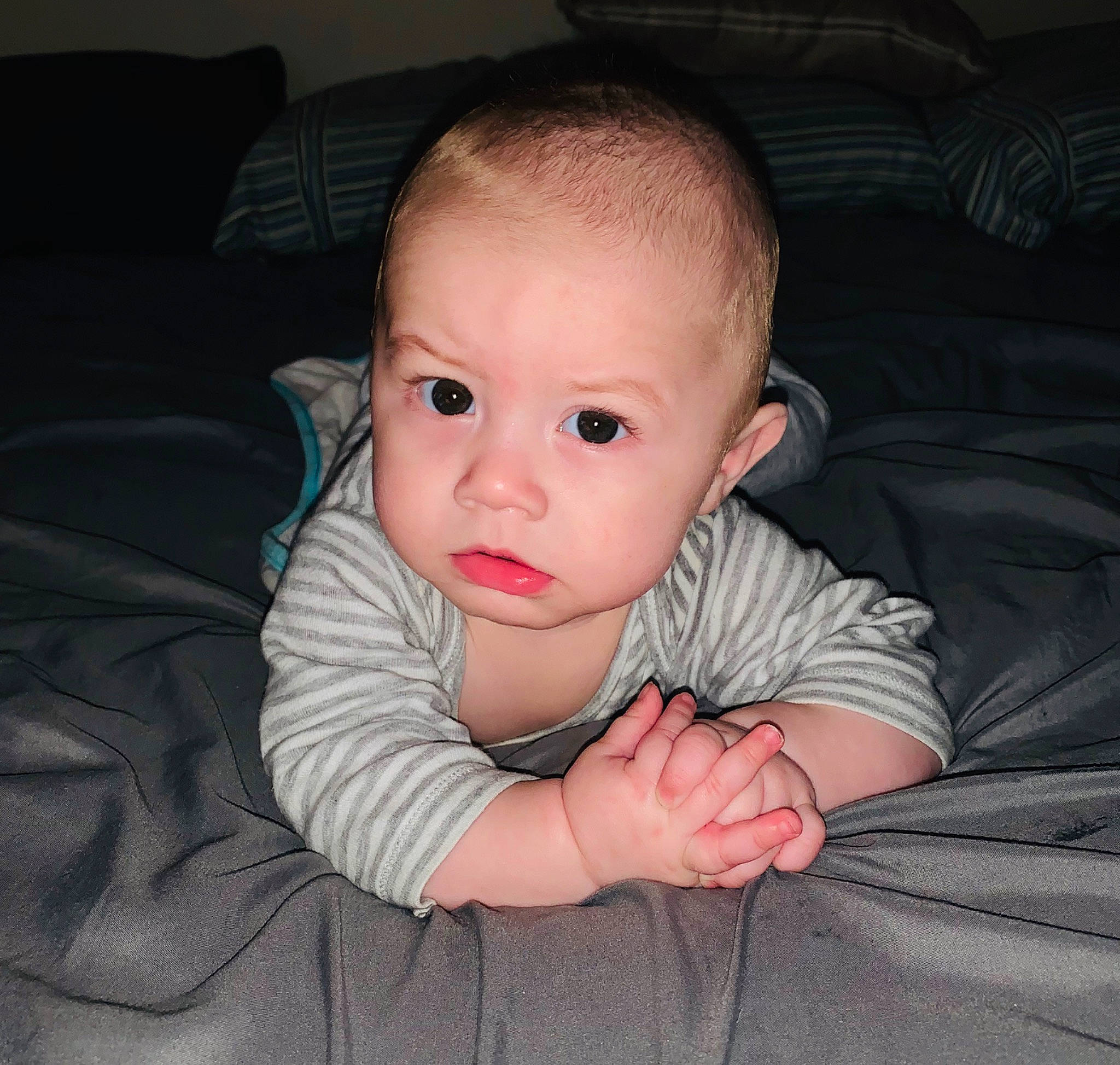 Zavian joined the competition — help win amazing prizes! baby, baby_toddler_clothing, cheek, comfort, couch, eye, eyebrow, flash_photography, flooring, fun, grey, head, iris, lip, mouth, nose, person, sleeve, smile, toddler