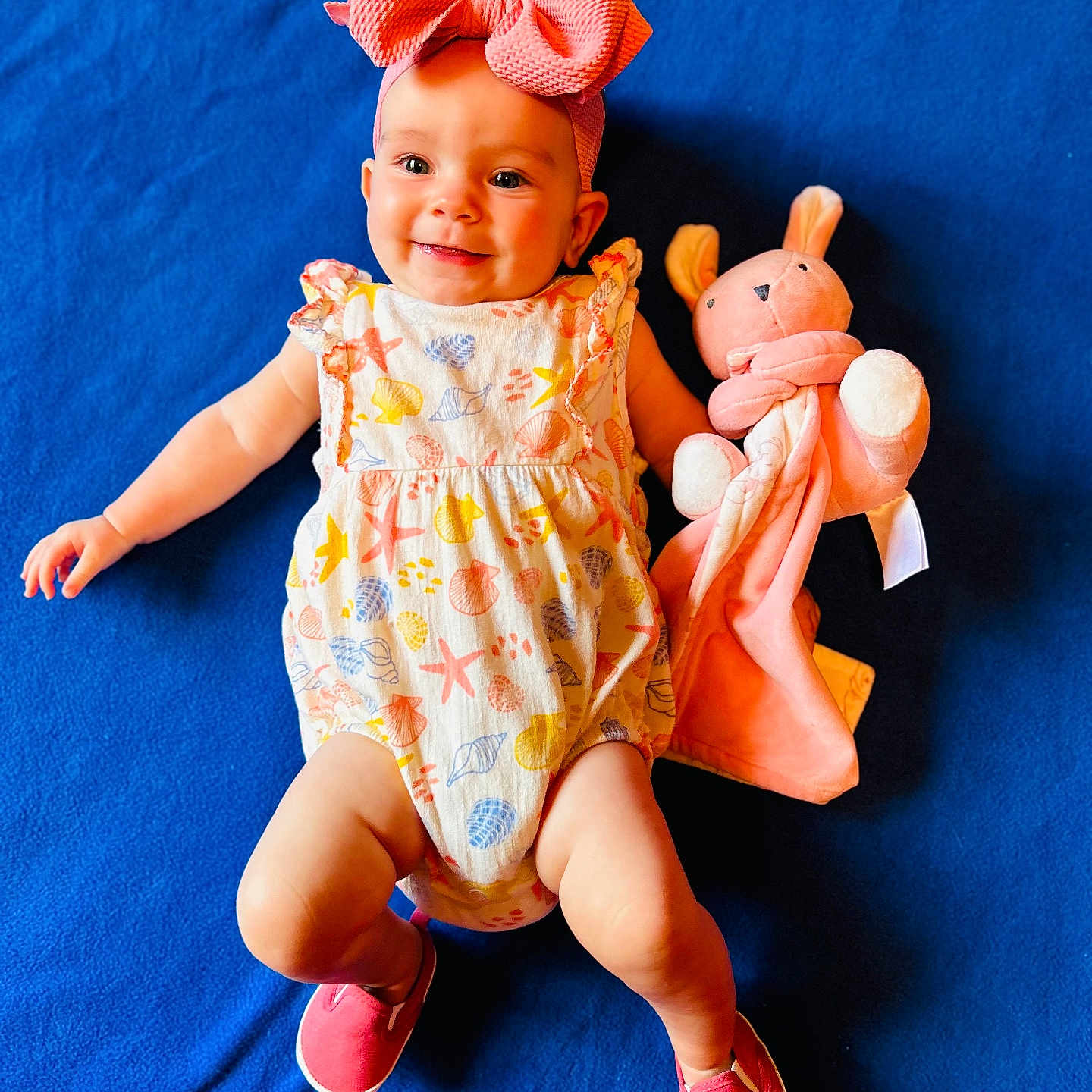 Siobhan joined the competition — help win amazing prizes! accessories, baby, clothing, couch, doll, dress, face, footwear, furniture, hat, head, newborn, person, photography, plush, portrait, shoe, sitting, teddybear, toy