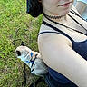 animal, casual, cat, choker_necklace, field, grass, greenery, harness, leash, nature, outdoor, pet, relaxed, selfie, shoulder, siamese_cat, sitting, smile, tank_top, woman