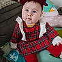 baby, blanket, blue_eyes, child, clothing, couch, cute, fabric, headband, home, indoor, infant, lace, person, plaid_dress, portrait, red_bow, sitting, soft_toys, toddler