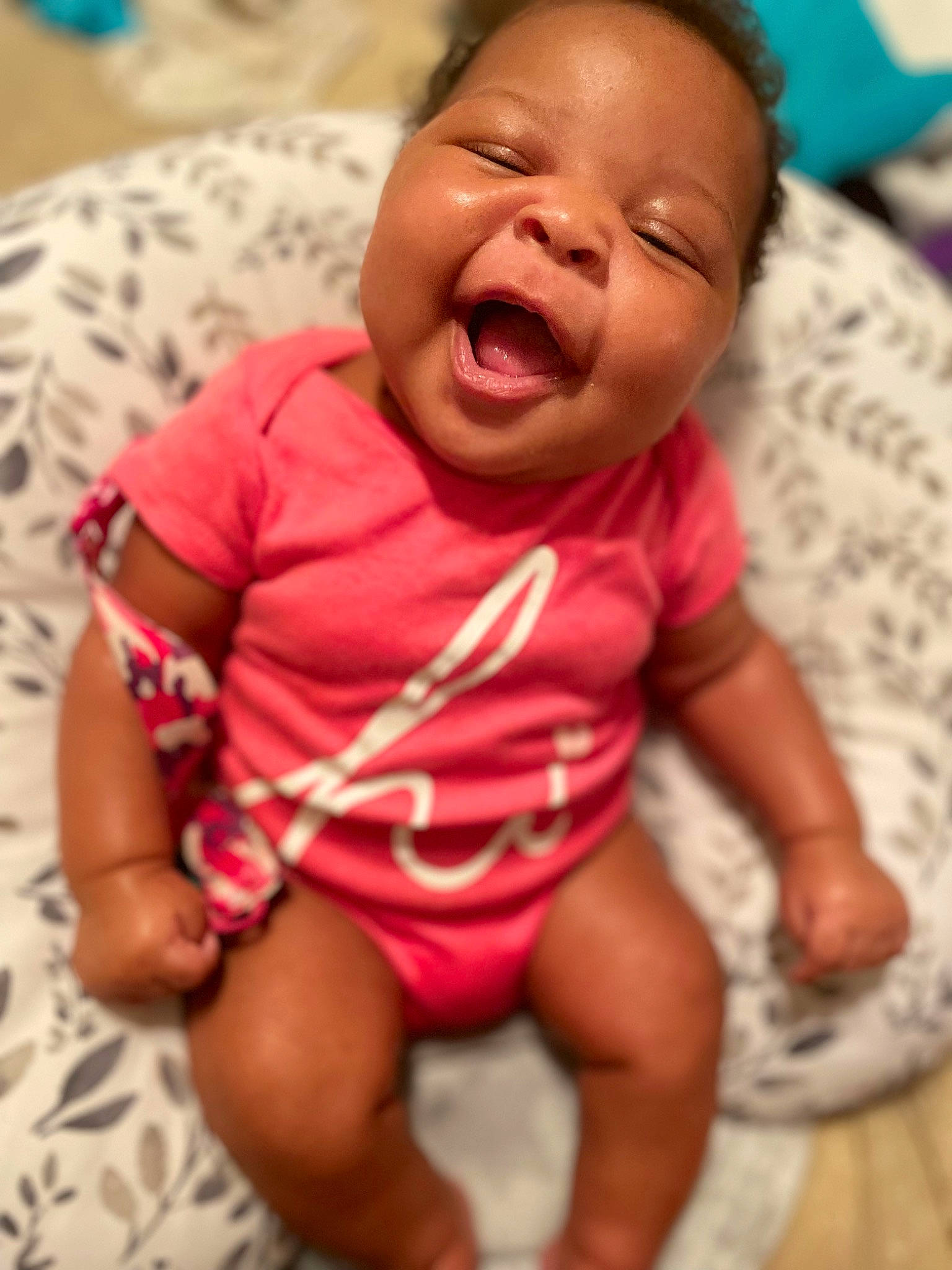 Innocence is registered to the contest to win money with this photo: baby, baby_toddler_clothing, cheek, chin, comfort, eyebrow, face, finger, happy, iris, lip, mouth, neck, nose, organ, person, pink, skin, sleeve, smile