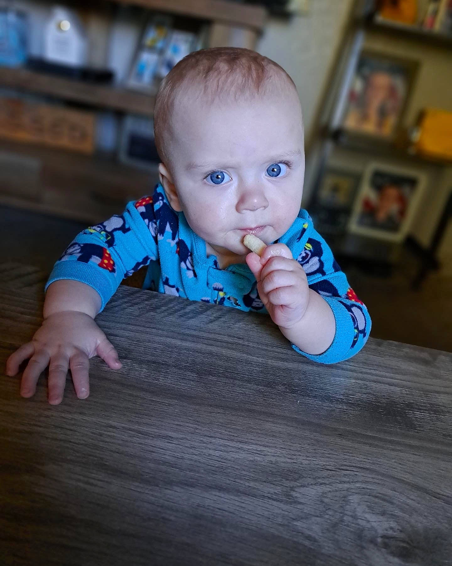 Beau is registered to the contest to win money with this photo: baby, baby_toddler_clothing, cheek, child, finger, flash_photography, floor, flooring, fun, happy, hardwood, head, iris, nose, person, picture_frame, sitting, skin, sleeve, toddler