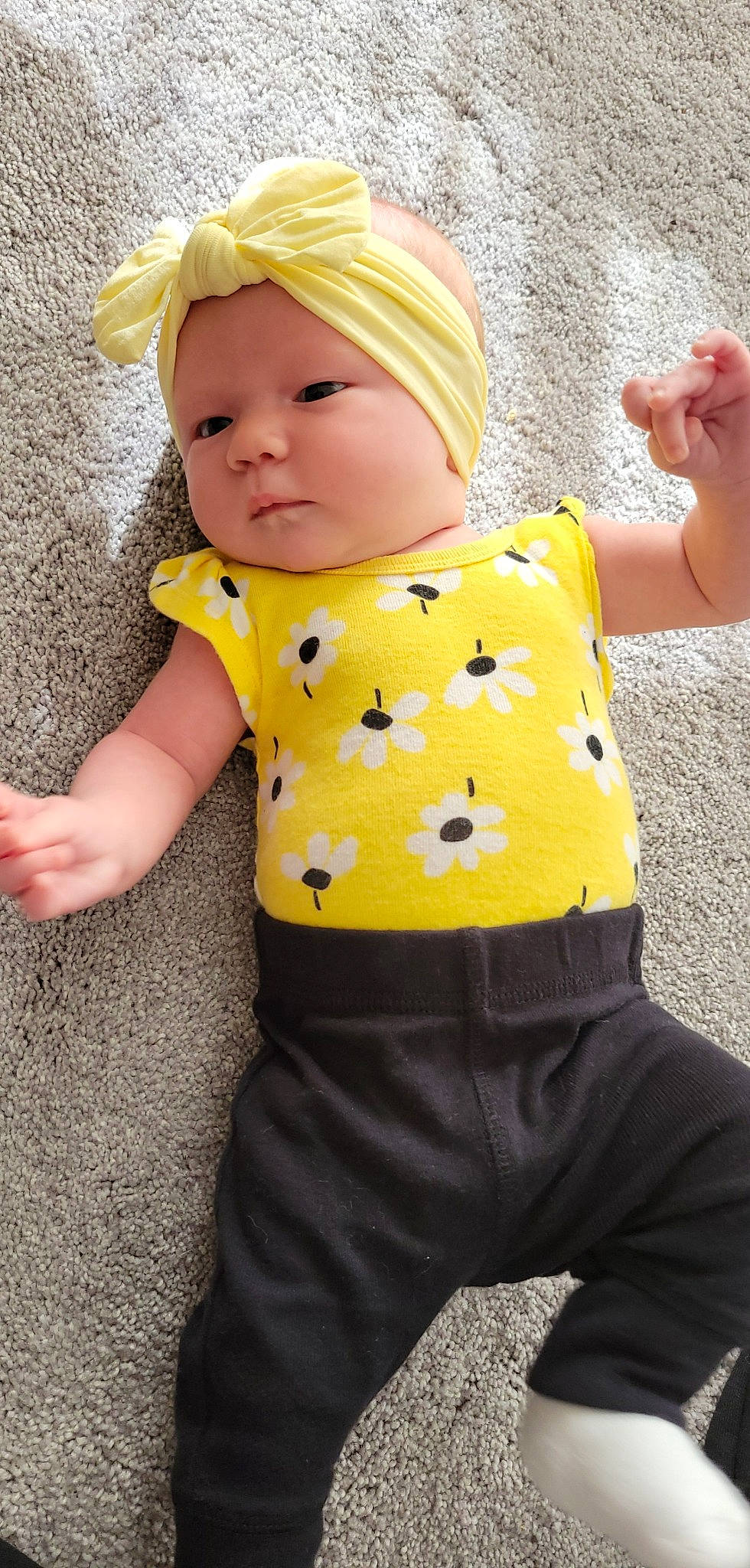 Kelsey is registered to the contest to win money with this photo: baby, baby_toddler_clothing, cheek, clothing, cool, facial_expression, finger, gesture, hand, headwear, human, joint, leg, orange, outerwear, person, pink, product, skin, sleeve