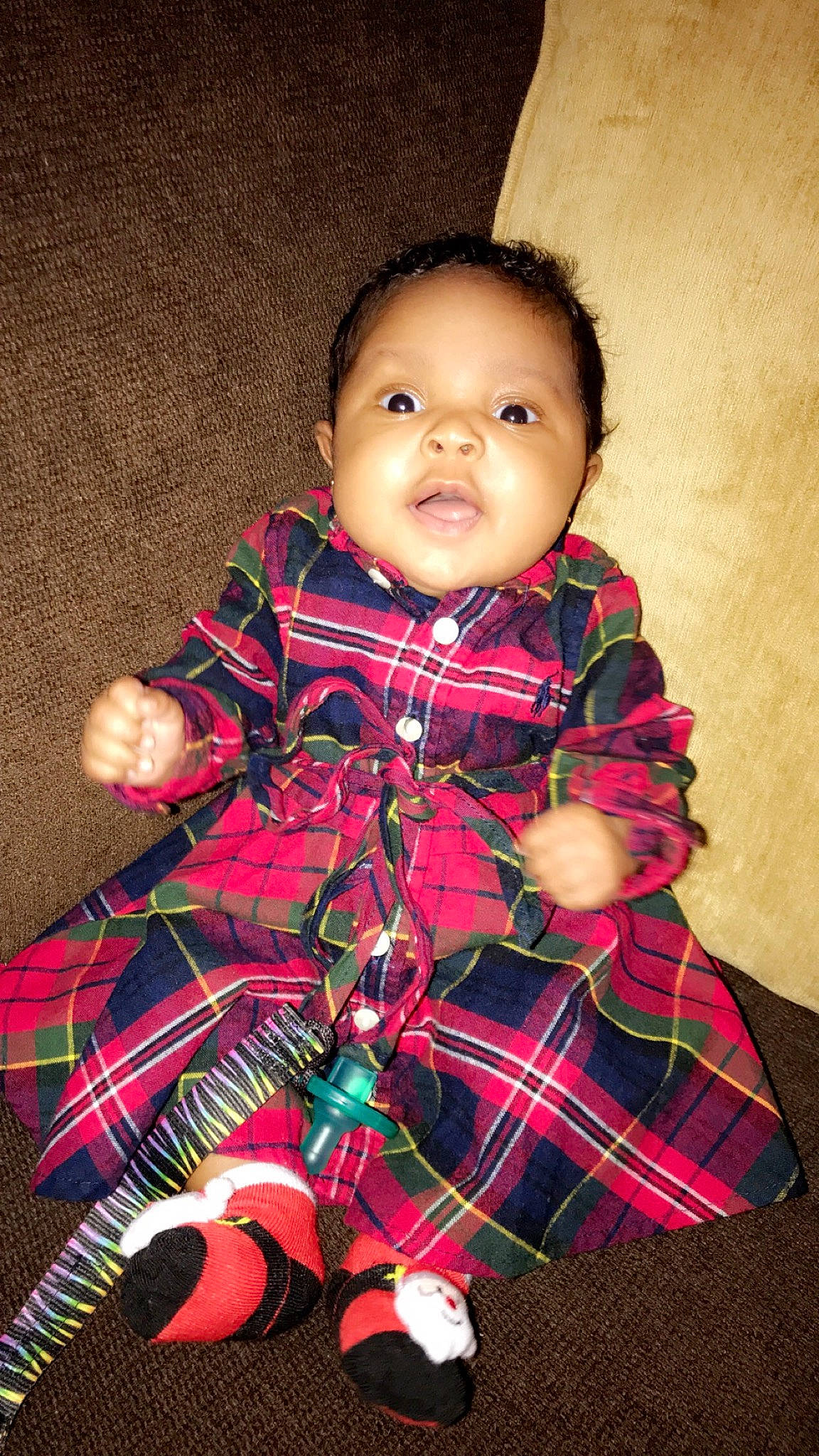 Kyndall joined the competition — help win amazing prizes! child, design, fun, girl, infant, outerwear, pattern, person, plaid, sitting, skin, smile, standing, tartan, toddler, tradition