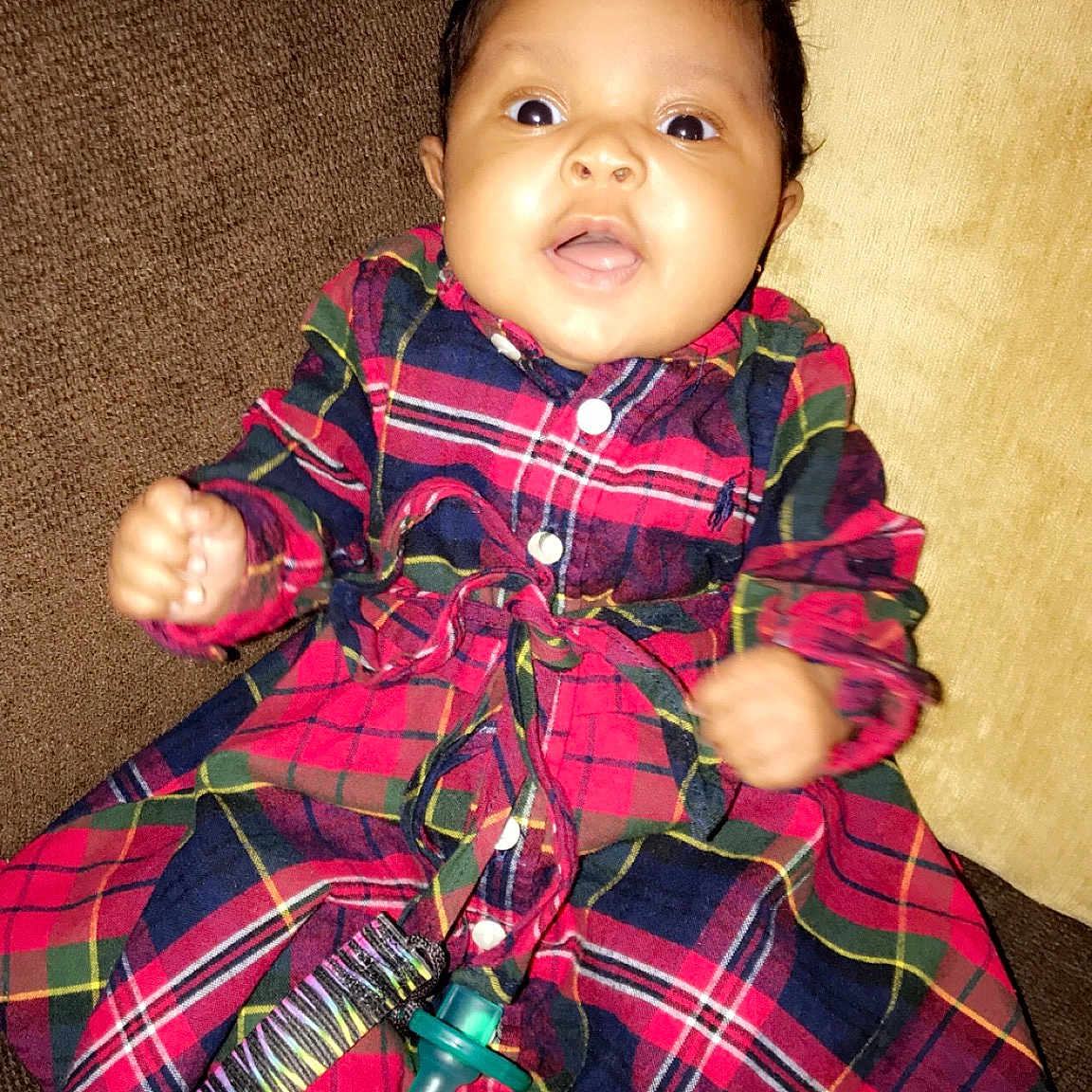 Kyndall joined the competition — help win amazing prizes! child, design, fun, girl, infant, outerwear, pattern, person, plaid, sitting, skin, smile, standing, tartan, toddler, tradition