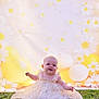 Ambre participe au concours pour gagner de l'argent avec cette photo : baby, child, grass, dress, floral, smile, outdoor, flower_pattern, balloon, background, greenery, sitting, cute, happy, sunlight, nature, portrait, infant, celebration, yellow