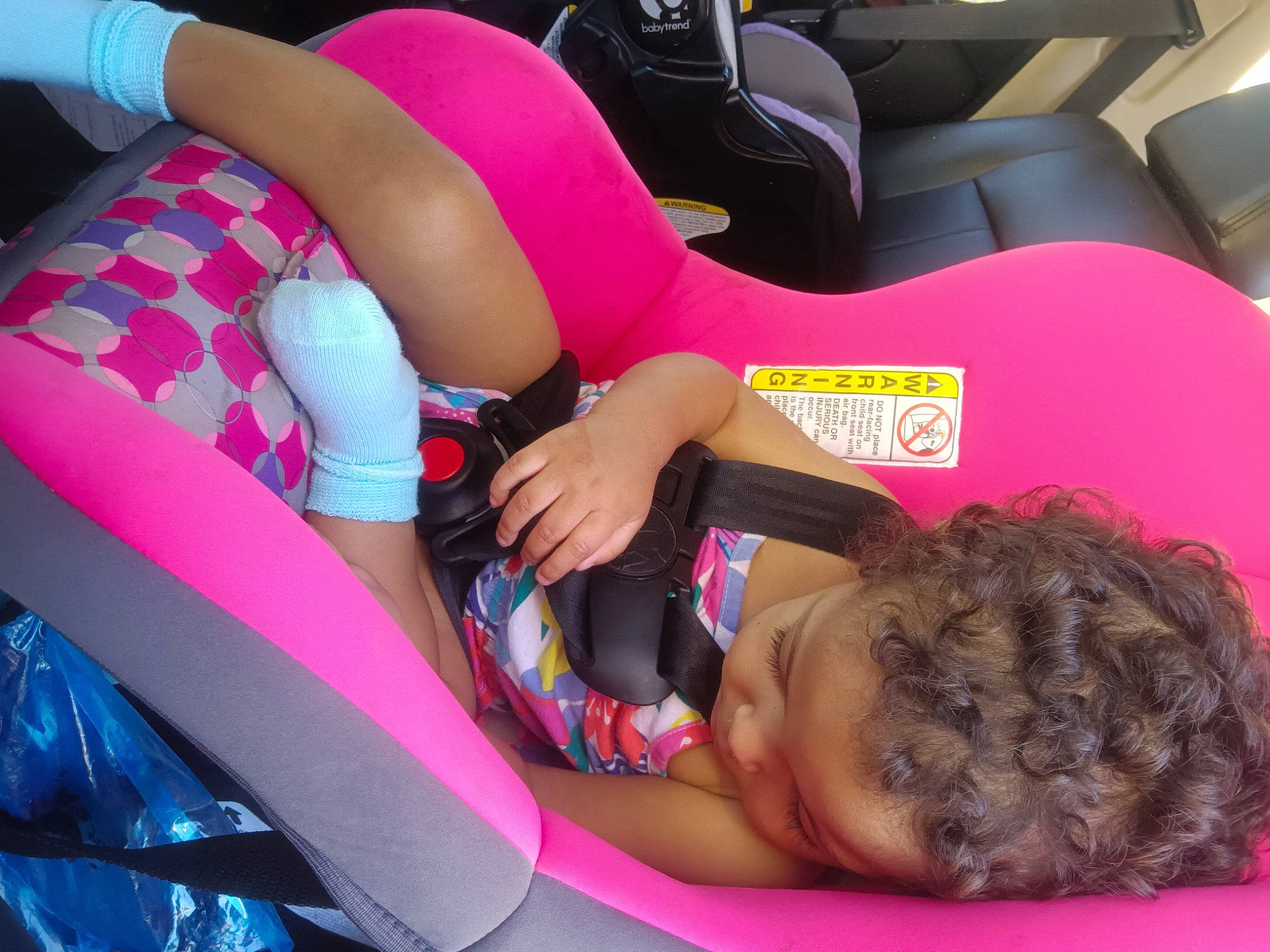 Elaina is registered to the contest to win money with this photo: automotive_design, black_hair, car_seat, car_seat_cover, comfort, finger, fun, human_body, human_leg, joint, knee, lap, leg, leisure, magenta, nail, person, pink, product, shorts