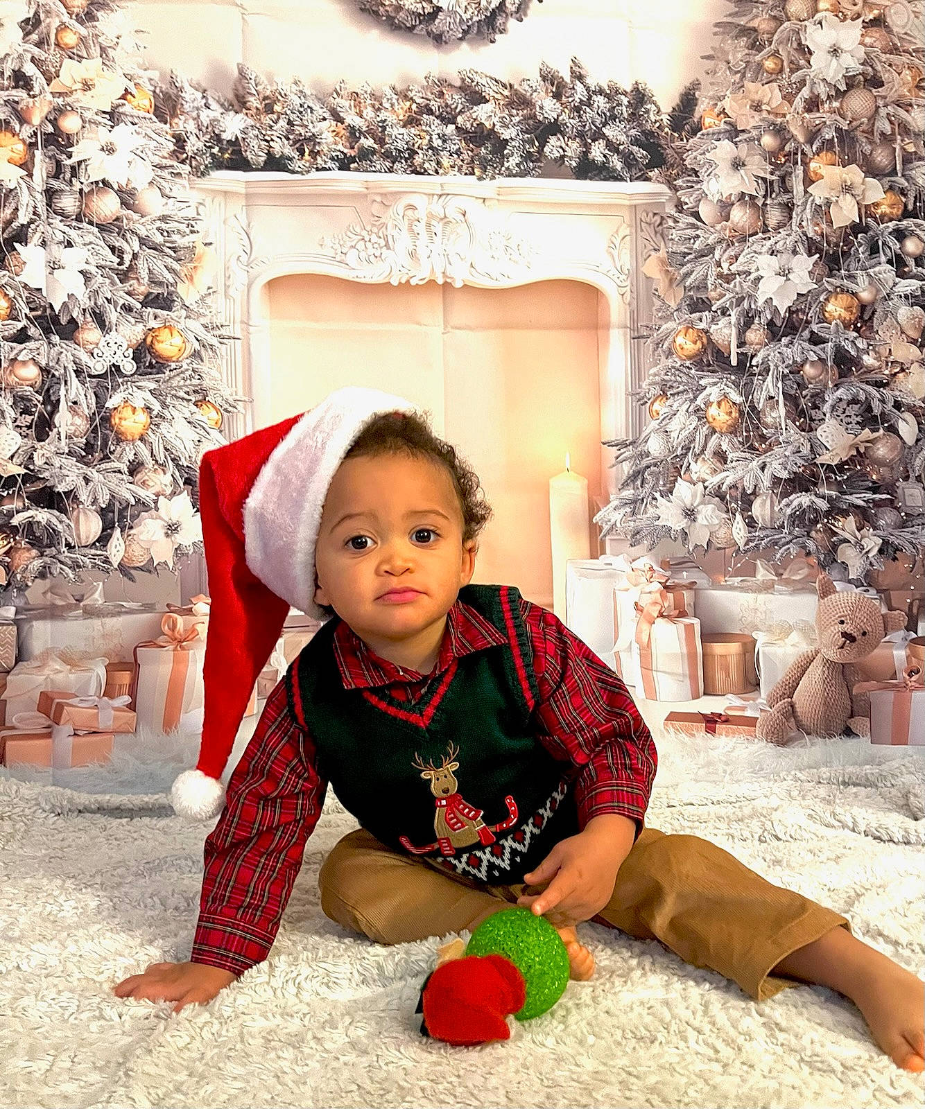 Damion joined the competition — help win amazing prizes! beauty, carmine, child, christmas, christmas_decoration, christmas_eve, christmas_ornament, event, flooring, happy, holiday, living_room, ornament, person, photograph, room, sitting, toddler, tradition, tree