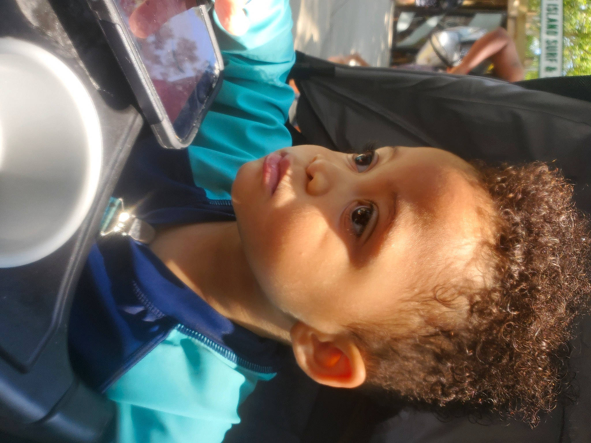 Damion is registered to the contest to win money with this photo: automotive_lighting, baby, cheek, child, cool, eyebrow, eyelash, fun, fur, lip, nose, person, toddler, tree