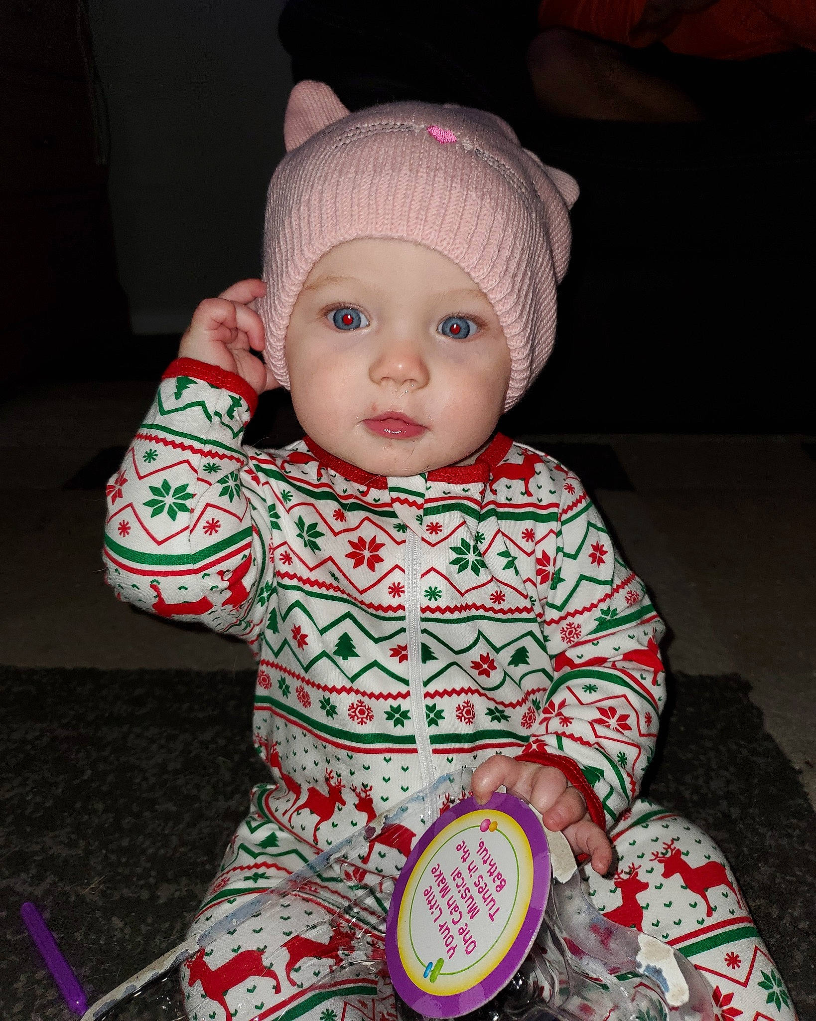 Hazel is registered to the contest to win money with this photo: baby, beanie, cheek, child, ear, eye, head, headgear, knit_cap, pattern, person, pink, skin, smile, toddler, wool