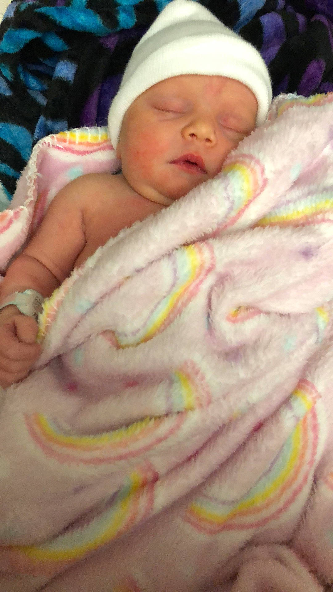 Hartley is registered to the contest to win money with this photo: baby, baby_products, baby_sleeping, baby_toddler_clothing, beanie, bedtime, cheek, child, comfort, creative_arts, headwear, human, linens, nail, person, pink, skin, sleep, textile, thread