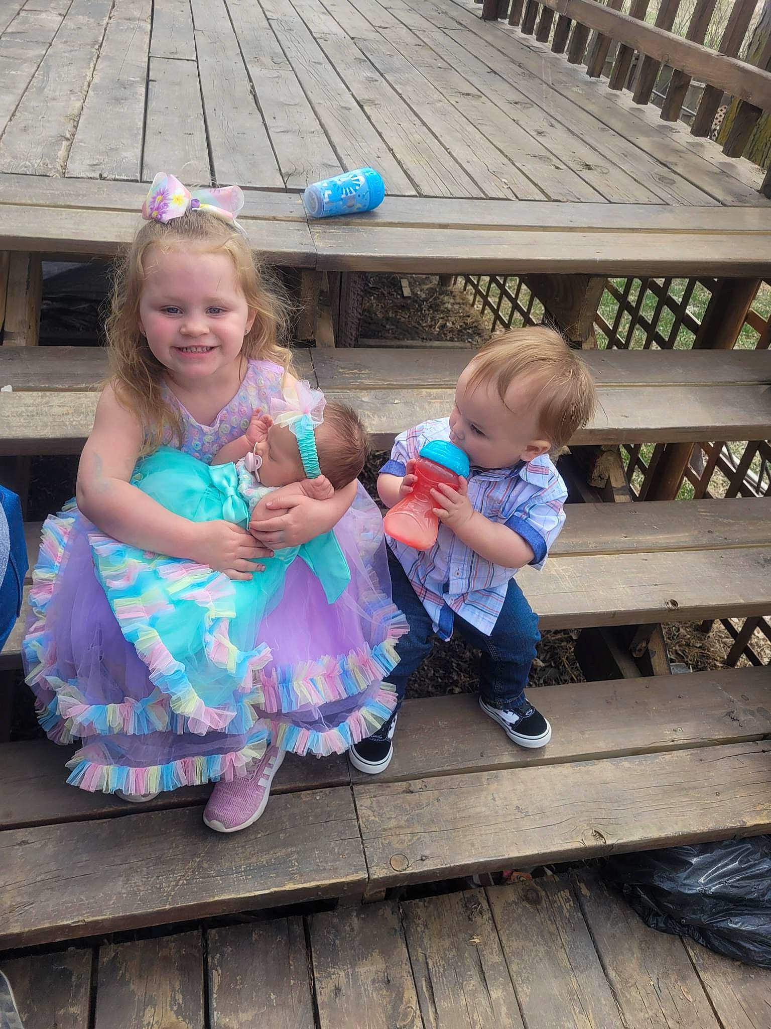 Eretria joined the competition — help win amazing prizes! baby_toddler_clothing, blue, child, event, fun, grass, happy, joy, leisure, organ, person, pink, play, public_space, recreation, sandal, sitting, skin, smile, toddler