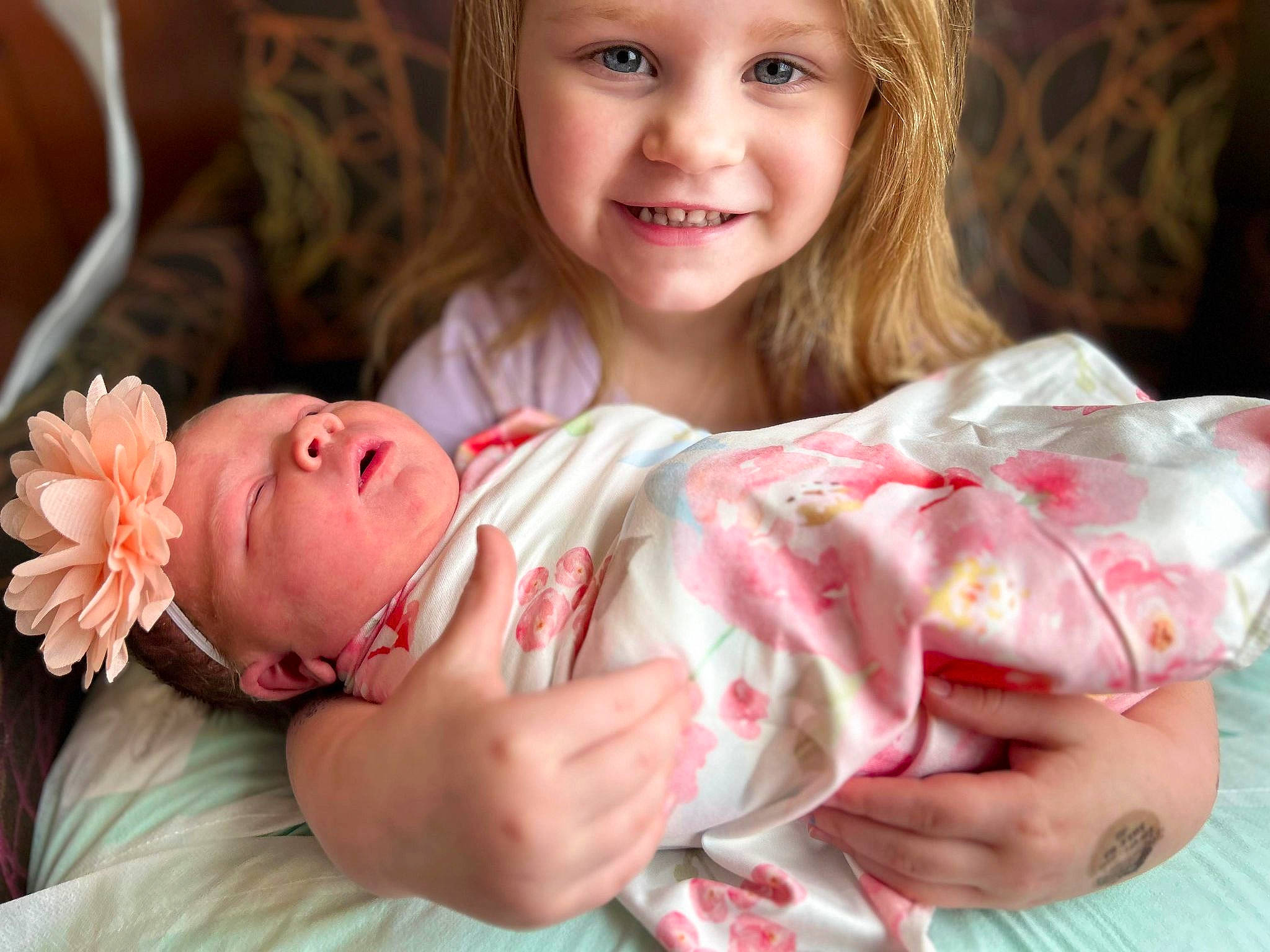 Eretria joined the competition — help win amazing prizes! baby, baby_toddler_clothing, cheek, child, comfort, eye, face, facial_expression, finger, flower, hair, hand, happy, head, headwear, human, joy, lip, person, pink