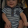 baby, infant, smile, striped_clothing, car_seat, child, happy, cute, onesie, sitting, toy, cushion, face, person, young_child, indoor, safety_label, hand, leg, closeup