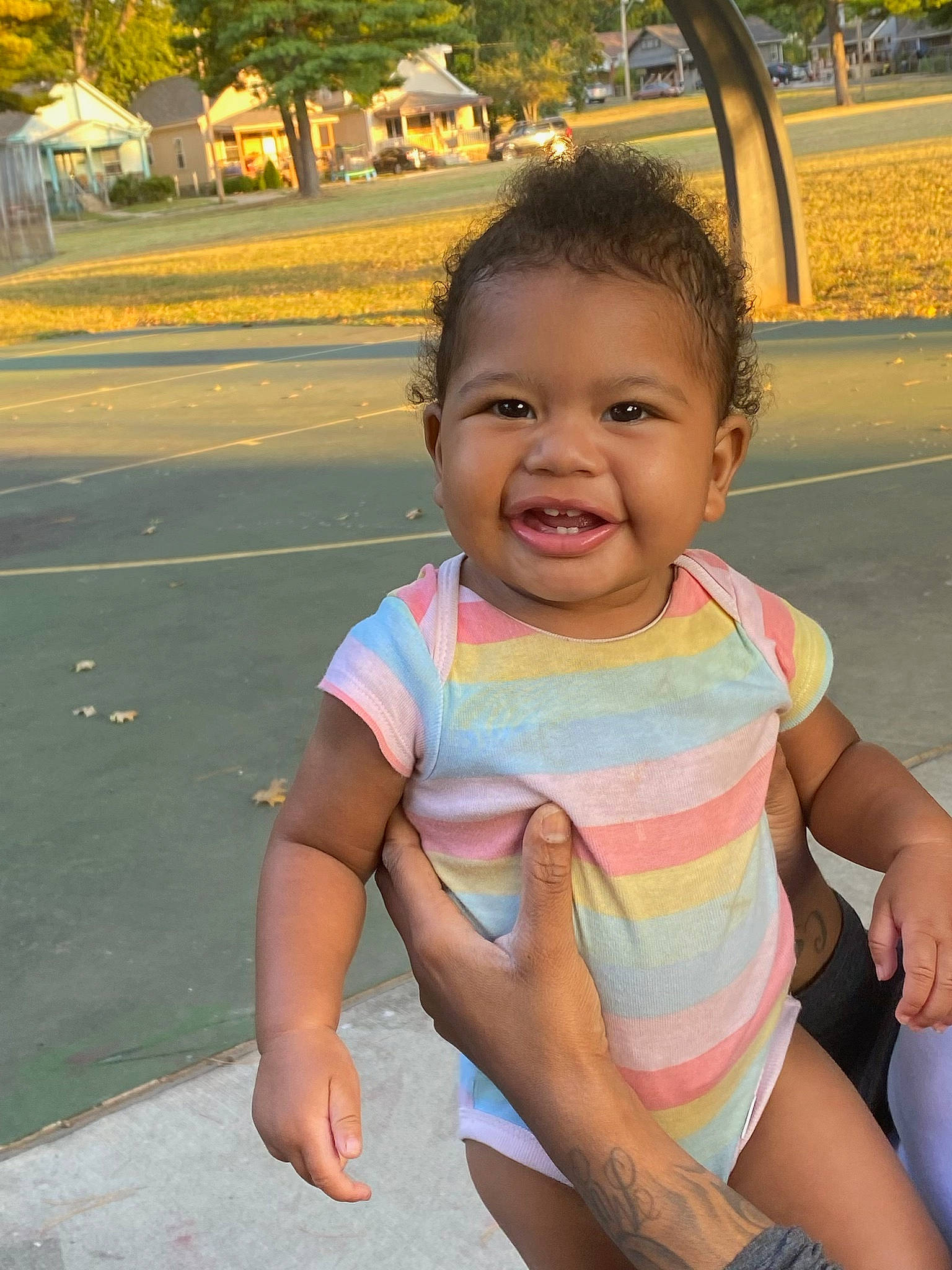 Joelle joined the competition — help win amazing prizes! baby_toddler_clothing, cheek, chin, cool, eye, facial_expression, grass, hairstyle, happy, iris, leisure, mammal, mouth, nose, person, plant, public_space, skin, smile, tree