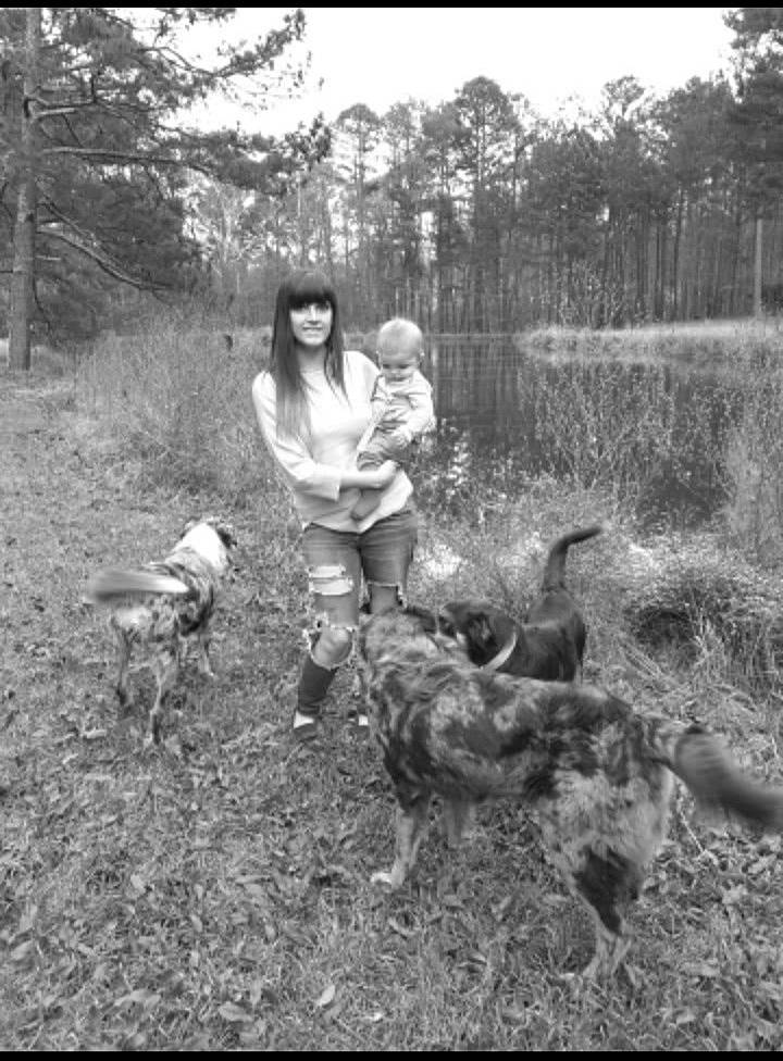 Moon Py is registered to the contest to win money with this photo: bird, black_and_white, boot, carnivore, dog, fun, grass, mammal, monochrome, monochrome_photography, people_in_nature, plant, sitting, soil, sporting_group, stock_photography, toddler, tree, vertebrate, vintage_clothing