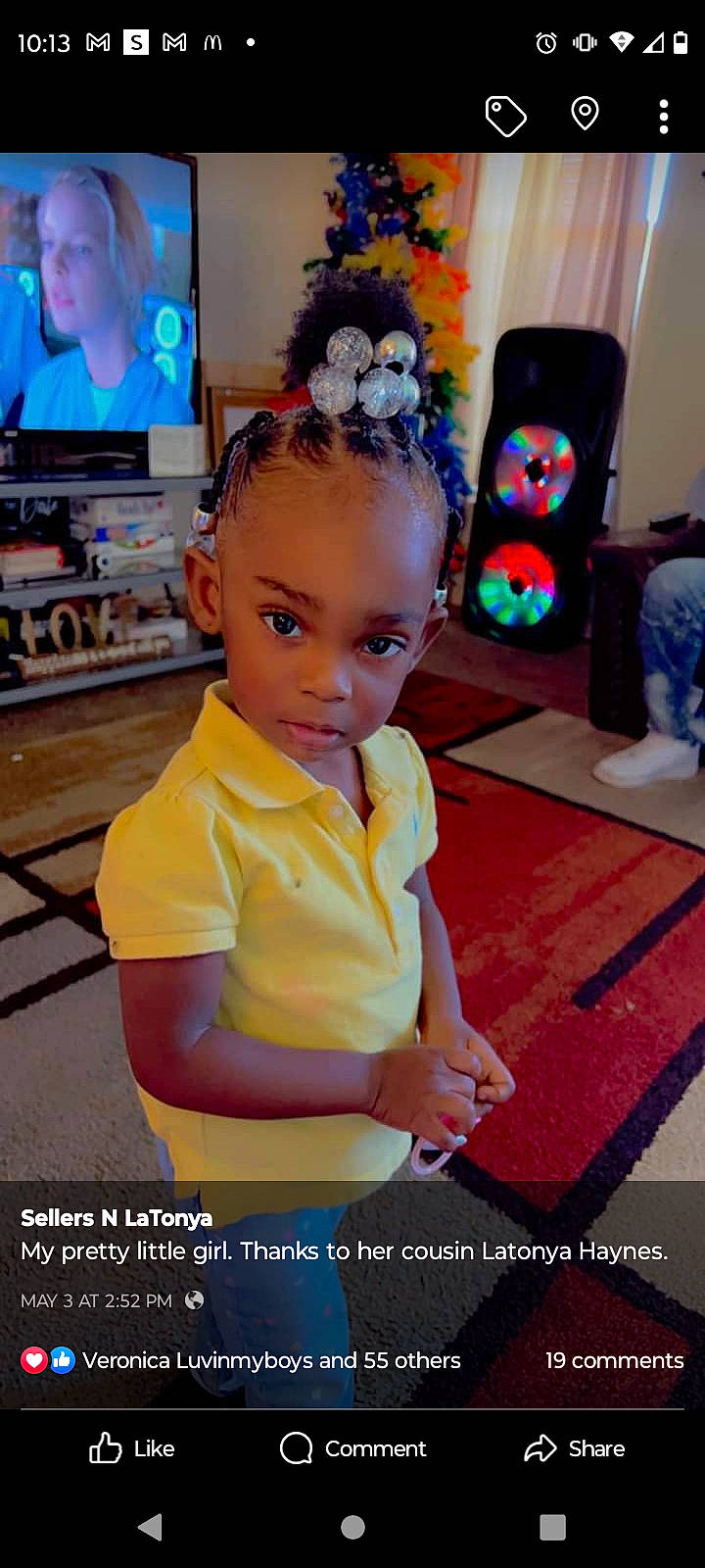 Michaela is registered to the contest to win money with this photo: audio_equipment, chair, child, desk, entertainment, event, fashion_accessory, flooring, fun, happy, headband, jewellery, led_backlit_lcd_display, leisure, person, photo_caption, room, sitting, t_shirt, television