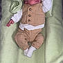 baby, sleeping, infant, blanket, clothing, vest, pants, white_socks, soft_texture, indoors, cute, resting, newborn, child, portrait, peaceful, small_hands, nap, cozy, sleepwear