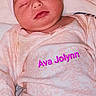 Ava joined the competition — help win amazing prizes! newborn, baby, sleeping, infant, portrait, pink, bow, headband, onesie, blanket, bed, indoors, face, closed_eyes, peaceful, text_overlay, name, lying_down, swaddled, cute
