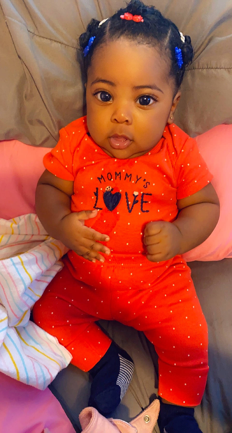 Kash Ali is registered to the contest to win money with this photo: baby, cheek, child, eye, face, iris, lip, nose, orange, person, skin, toddler