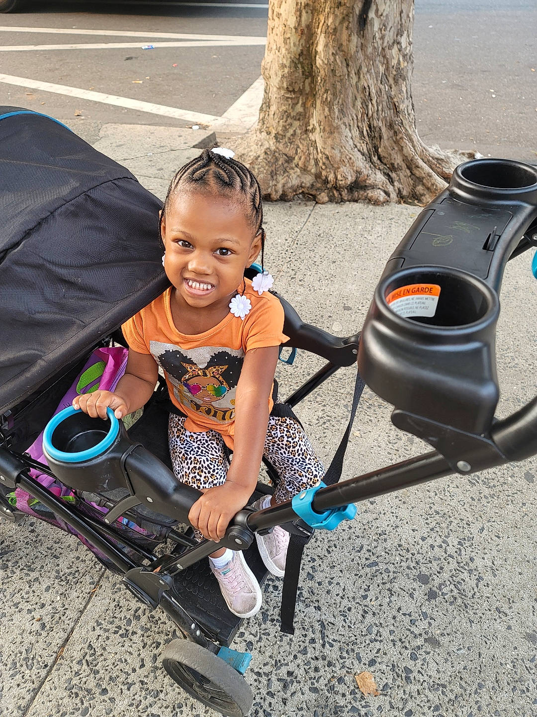 Reality joined the competition — help win amazing prizes! asphalt, auto_part, automotive_exterior, automotive_tire, baby_carriage, child, electric_blue, fun, gas, joy, leisure, motor_vehicle, person, recreation, sitting, smile, tire, toddler, travel, tree