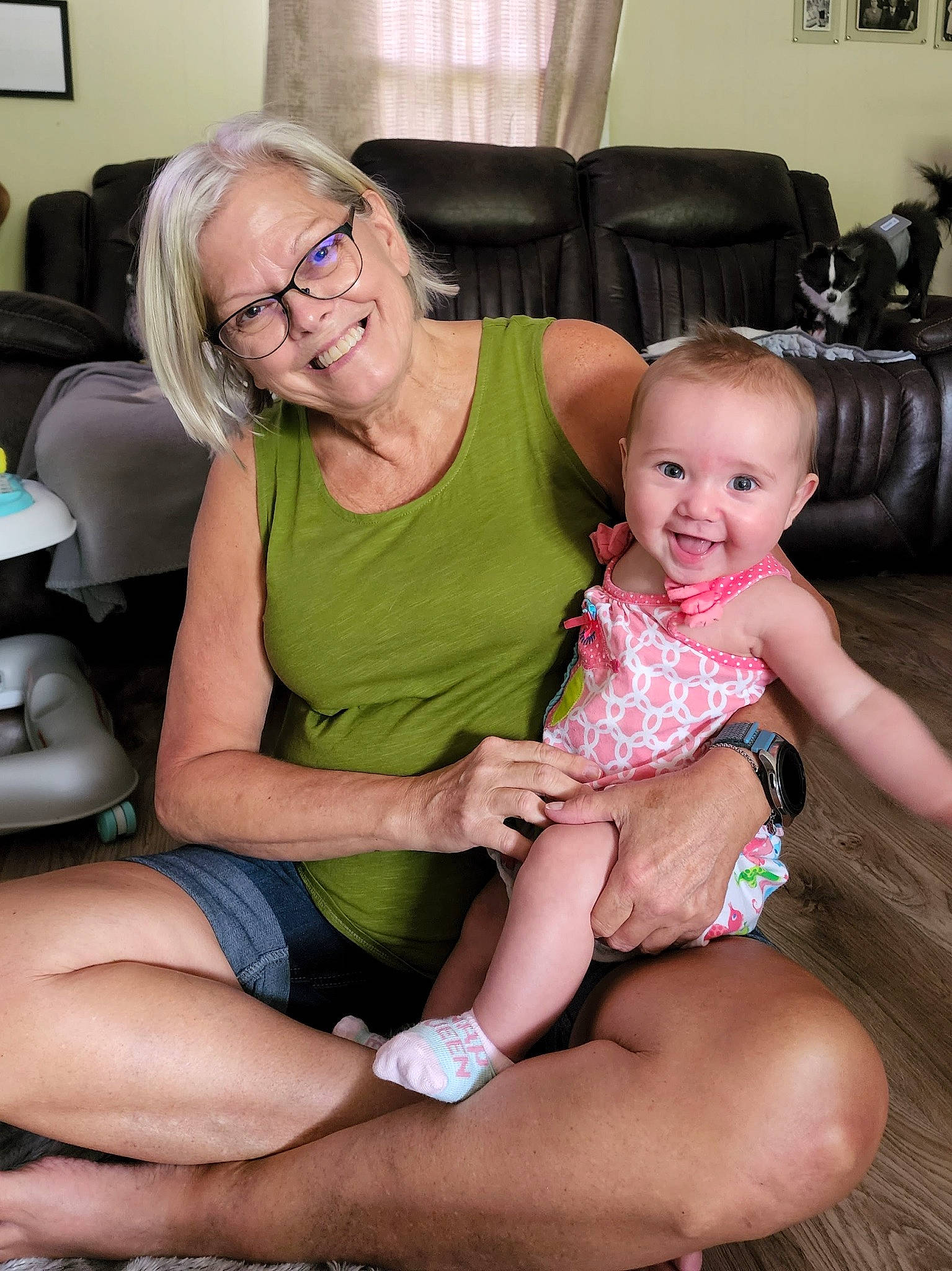 Mckenna joined the competition — help win amazing prizes! arm, comfort, couch, face, finger, fun, furniture, glasses, hand, happy, human_body, interaction, joy, lap, leg, mouth, muscle, person, picture_frame, skin