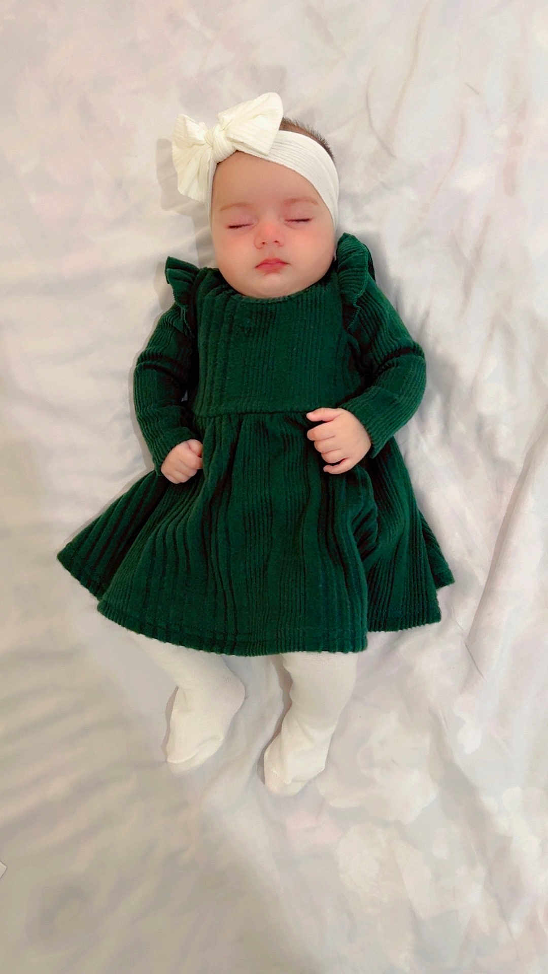Pareshay joined the competition — help win amazing prizes! baby, sleeping, infant, dress, headband, bow, white_tights, lying_down, soft_surface, peaceful, child, cute, indoors, portrait, cozy, clothing, young_child, resting, adorable, fashion