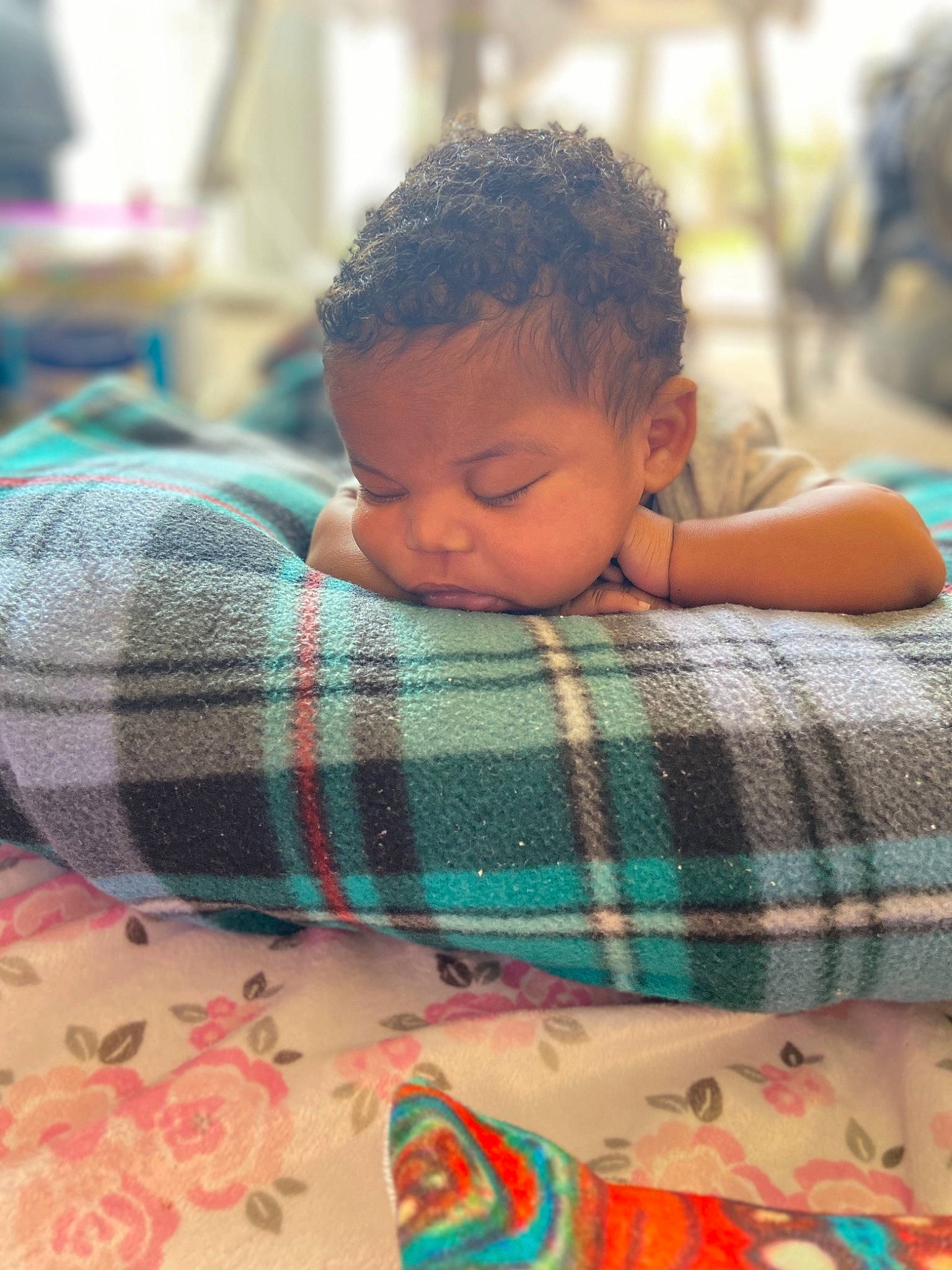 Charles joined the competition — help win amazing prizes! adaptation, baby, child, comfort, facial_expression, finger, flooring, happy, human, leisure, linens, mammal, person, plaid, red, skin, t_shirt, tartan, textile, toddler