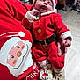 Ares participe au concours pour gagner de l'argent avec cette photo : baby, infant, sleeping, christmas, santa_outfit, red_clothing, reindeer_slippers, holiday, festive, cute, person_holding, indoor, floor, wooden_floor, sweater, hand, cozy, seasonal, cute_baby, sleep