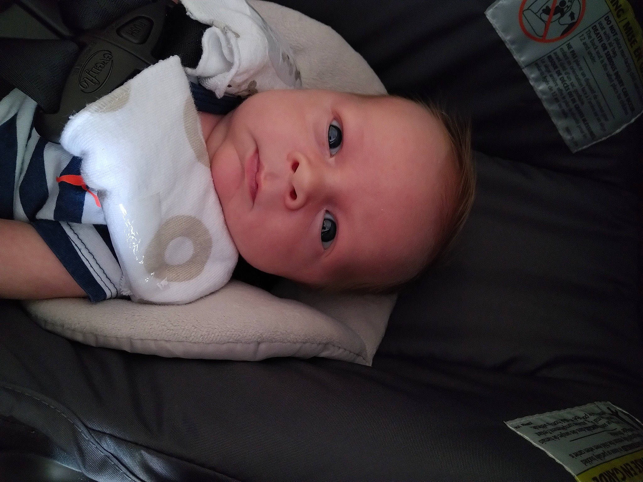 Kaden is registered to the contest to win money with this photo: baby, baby_carriage, baby_products, baby_safety, baby_toddler_clothing, carmine, cheek, child, comfort, hat, iris, lip, mouth, person, room, sitting, sleeve, toddler