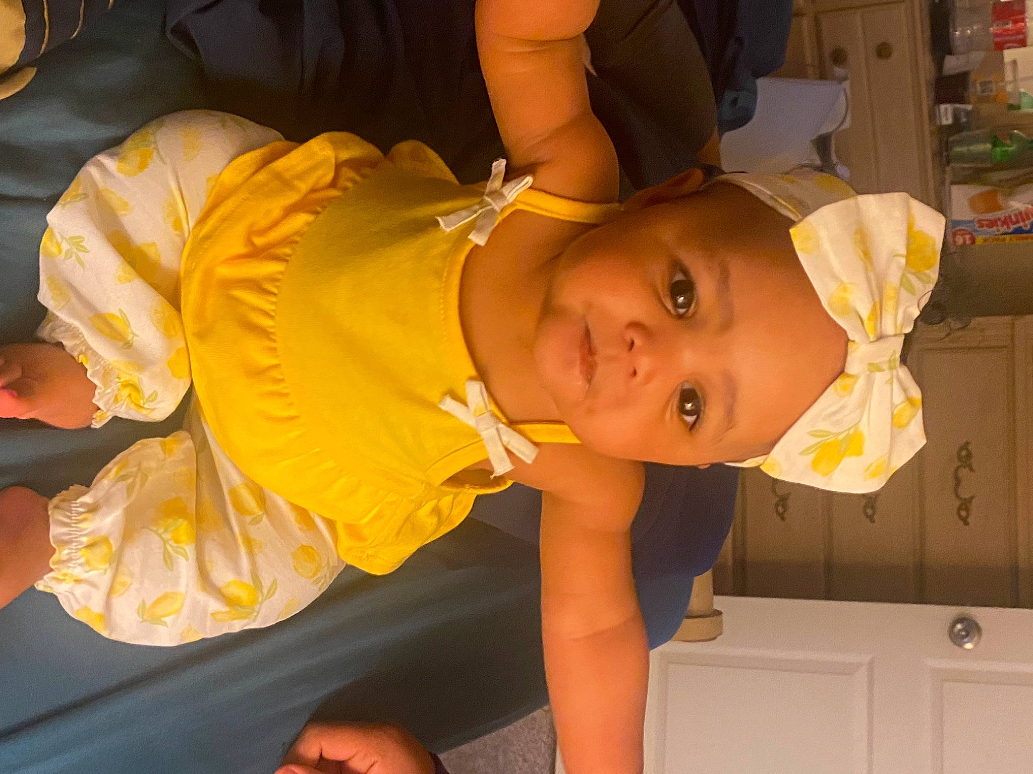 Nevaeh joined the competition — help win amazing prizes! abdomen, baby, baby_toddler_clothing, cabinetry, child, cupboard, drawer, event, fun, happy, hat, kitchen_appliance, mouth, orange, person, room, shelf, smile, t_shirt, thigh