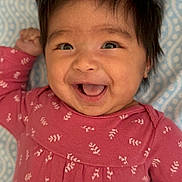Athena is registered to the contest to win money with this photo: baby, babylaughing, bodypart, clothing, face, happy, head, knitwear, laughing, longsleeve, mouth, pattern, person, photography, portrait, sleeve, smile, sweater, t_shirt, teeth