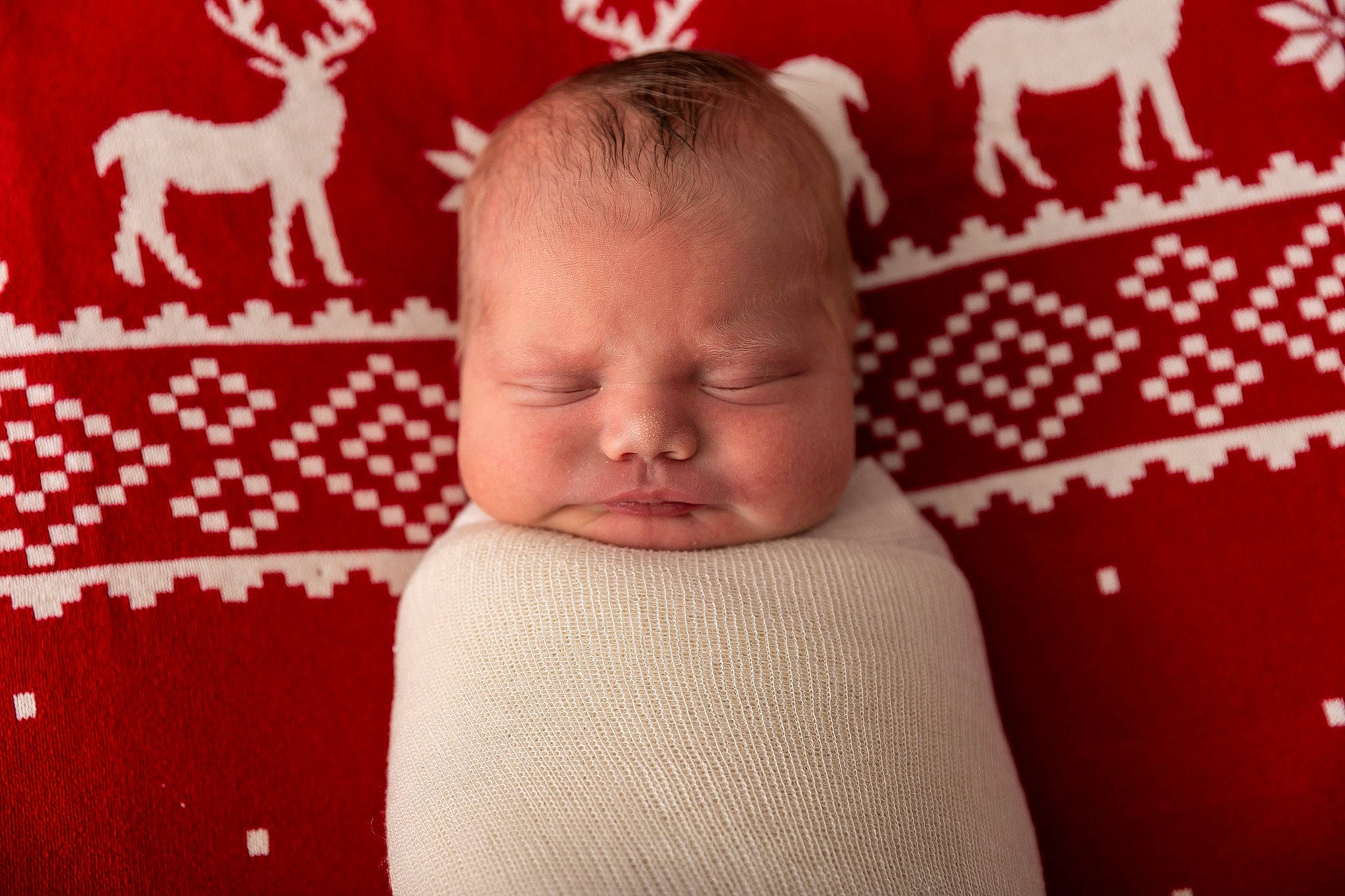 Chase is registered to the contest to win money with this photo: baby, baby_toddler_clothing, cheek, child, comfort, design, eye, face, happy, linens, mammal, pattern, person, pink, red, room, sleeve, toddler, vertebrate, white