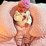 baby, child, infant, smiling, happy, portrait, flower_headband, pink_blanket, plush_blanket, cozy, lying_down, baby_clothing, long_sleeves, tutu, pink, nursery, indoor, soft_lighting, closeup, photography