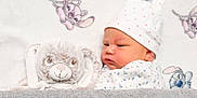 Lyliana participe au concours pour gagner de l'argent avec cette photo : baby, blanket, bunny, cartoon, child, comfort, cozy, cute, fabric, hat, indoor, infant, newborn, plush_toy, portrait, resting, sleeping_area, sleepwear, soft_texture, toddler