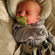 River joined the competition — help win amazing prizes! baby, bed, bodypart, car, car_interior, carseat, clothing, couch, cushion, face, finger, furniture, hand, hat, head, homedecor, newborn, person, transportation, vehicle