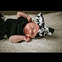 Brynley joined the competition — help win amazing prizes! newborn, baby, sleeping, black_clothing, headband, bow, carpet, infant, cute, peaceful, portrait, child, soft_texture, indoors, resting, adorable, face, small_hands, closed_eyes, lying_down