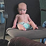 Andrew joined the competition — help win amazing prizes! baby, child, infant, sitting, chair, diaper, kitchen, indoors, portrait, face, blue_eyes, bald, serious, looking_at_camera, furniture, microwave, refrigerator, cabinets, home, photograph
