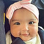Eliana joined the competition — help win amazing prizes! adorable, baby, baby_girl, car_seat, child, chubby_cheeks, closeup, clothing, cute, face, happy, headband, indoor, infant, person, pink, portrait, seatbelt, smile, young