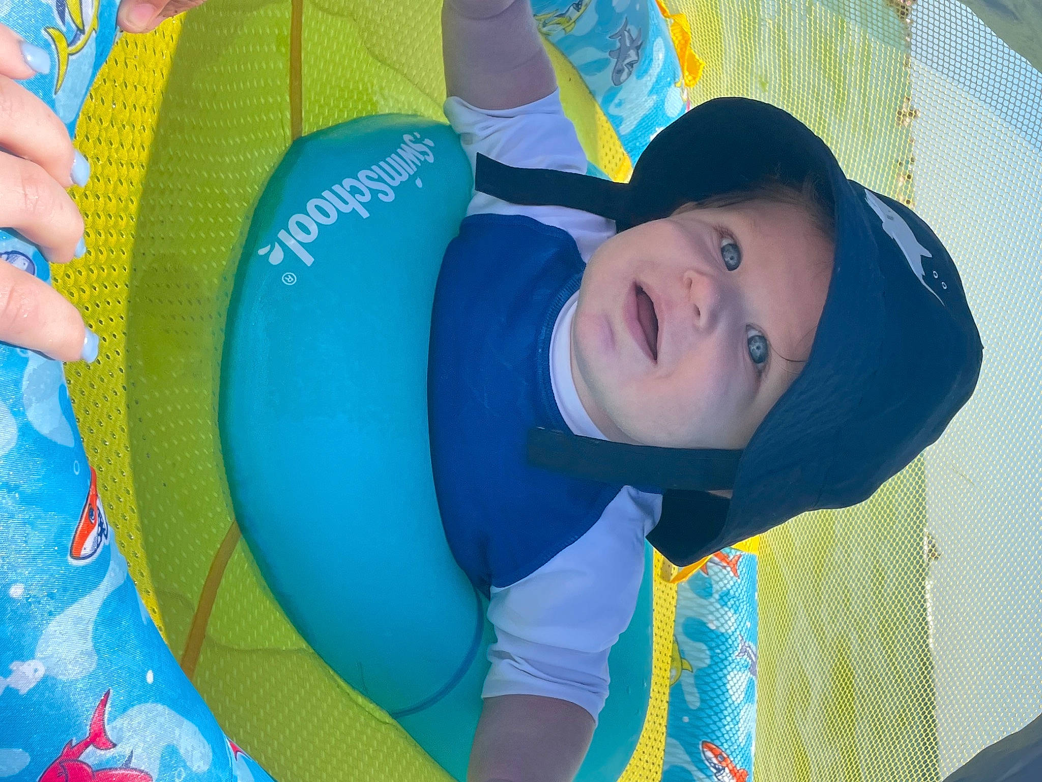 Garrett is registered to the contest to win money with this photo: baby, baby_products, baby_toddler_clothing, blue, child, comfort, electric_blue, facial_expression, fun, happy, headwear, leisure, nail, pattern, person, play, recreation, smile, toddler