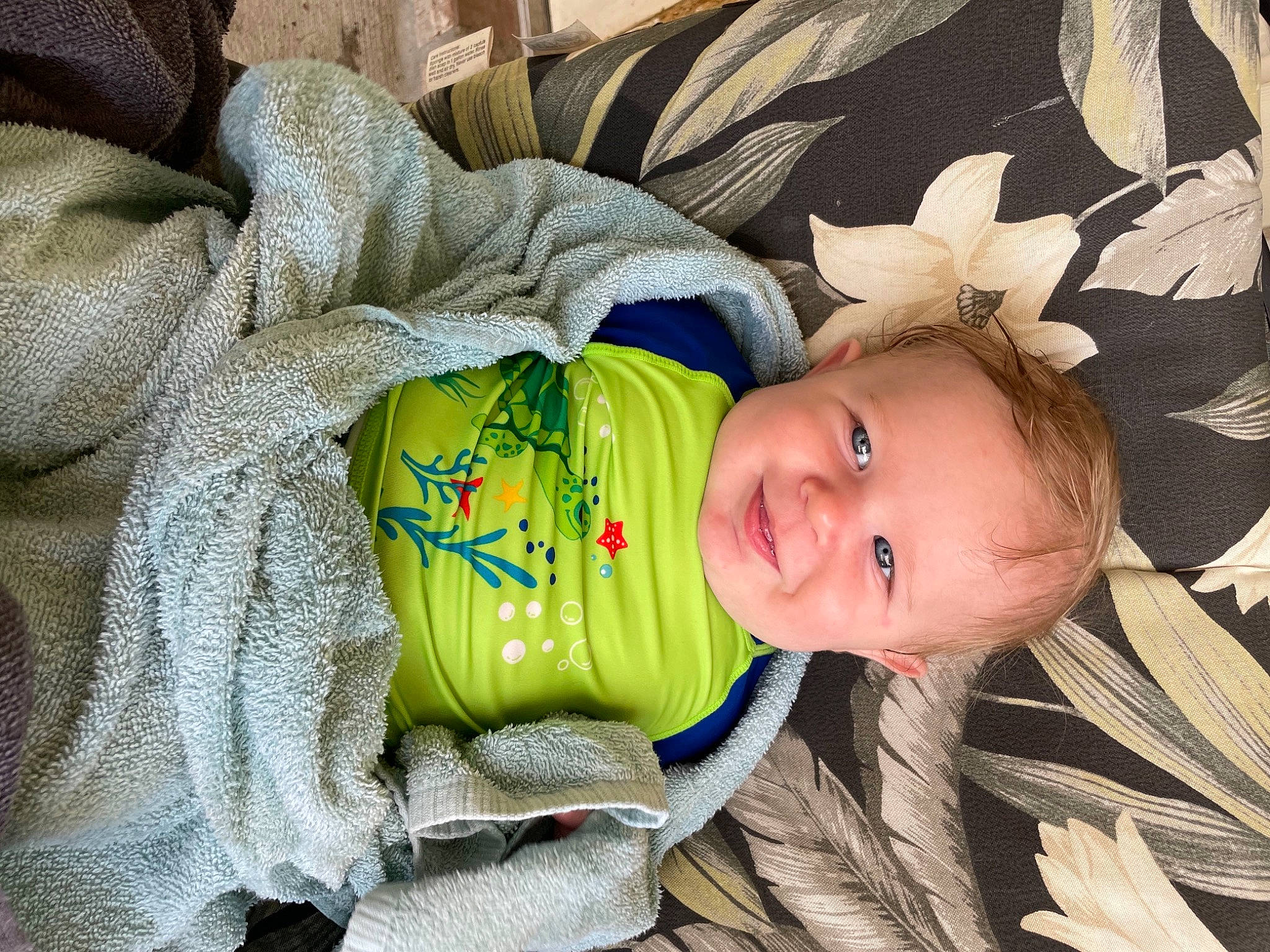 Garrett joined the competition — help win amazing prizes! baby, baby_products, baby_toddler_clothing, cheek, child, comfort, eye, grass, happy, head, iris, joy, leaf, linens, person, sitting, skin, sleeve, smile, textile