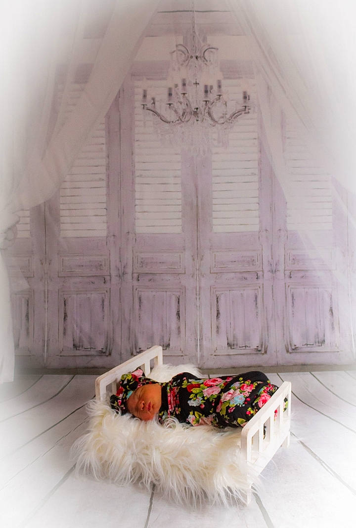 Cattleya is registered to the contest to win money with this photo: ceiling, christmas_decoration, decoration, door, event, fashion_accessory, flooring, floral_design, flower_arranging, font, grey, headwear, interior_design, natural_material, ornament, person, petal, photograph, rectangle, symmetry