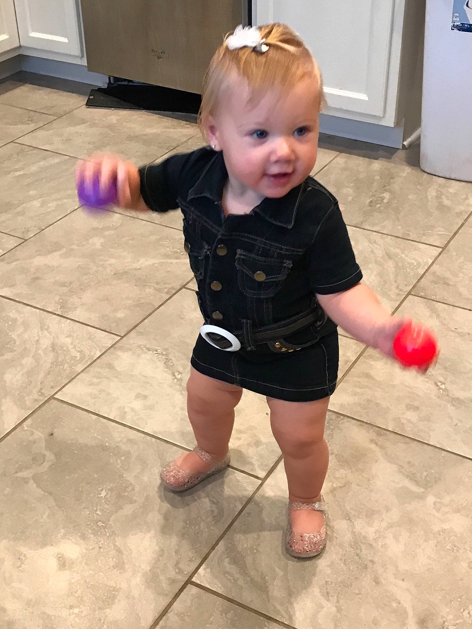 Marilyn Anthony is registered to the contest to win money with this photo: arm, ball, child, floor, flooring, joint, leg, person, play, shoulder, standing, toddler